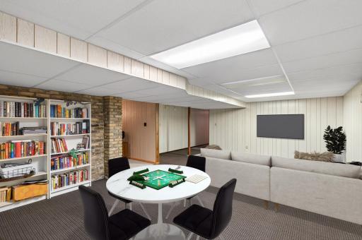 VIRTUALLY STAGED - spacious lower level is great for movie nights and games!