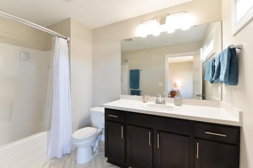 The primary bedroom features a private ensuite bathroom for added comfort and convenience.