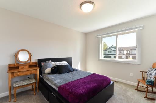 This is one of four well-appointed bedrooms located on the upper level.