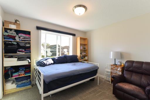 This is one of four well-appointed bedrooms located on the upper level.