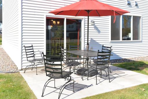 Just off the dining room, a cozy open patio offers a great spot to relax and unwind.