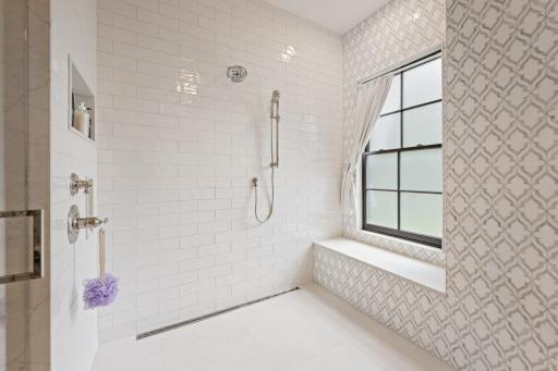 Fully tiled room for dual shower and soaking tub