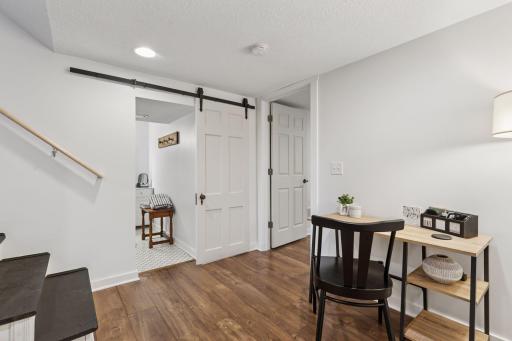 Home Office included on this level. Unique barn door adds extra charm to the bathroom entry.