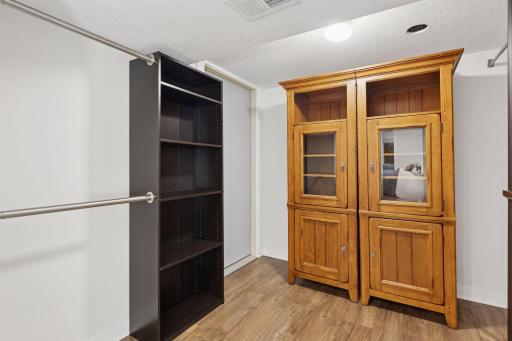Large Walk-in closet 8x7. Plenty of room for all your seasonal clothing.
