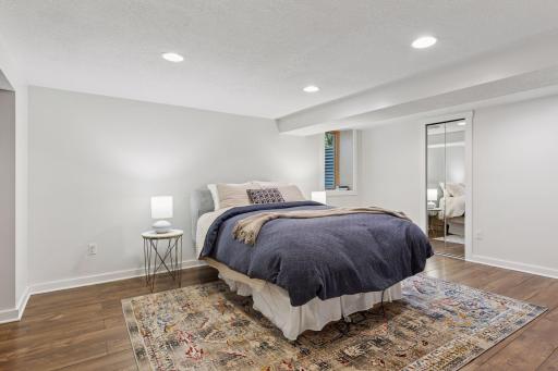 Gracious size Primary Suite with egress window. May also be used as a Great Room if not needed as a bedroom.