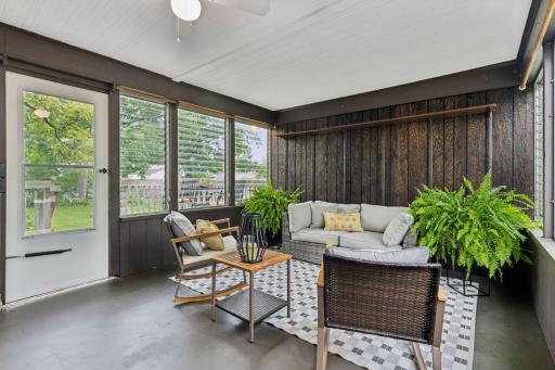 A rare find spacious Sun Porch with an abundance of natural light. Leads you to the deck and private backyard.