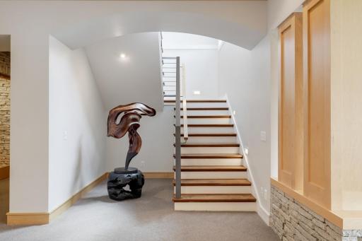 Custom powder coated steel railings on the stairway leading to the lower lower