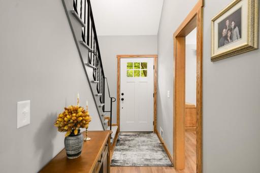 Front entryway highlights the homeâs gorgeous new trim throughout