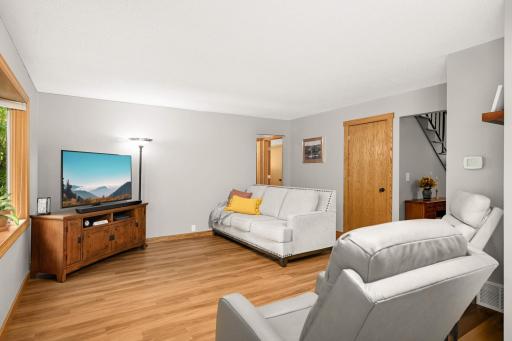 Freshly installed LVP flooring throughout the main level enhances the homeâs contemporary feel