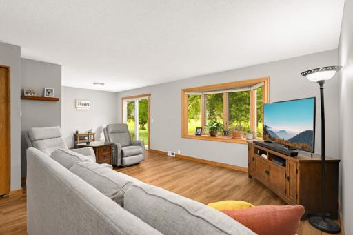 Plenty of natural light streams in through the elegant bay windows