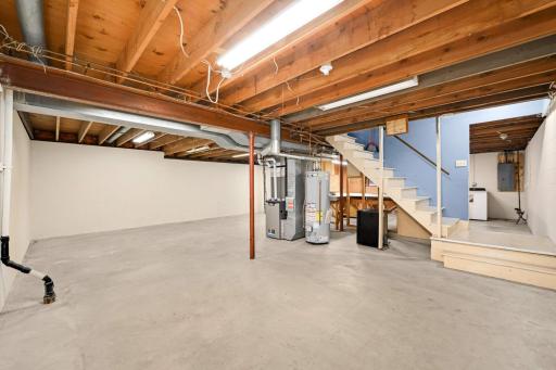 Unfinished lower level with endless possibilities for growth and investment