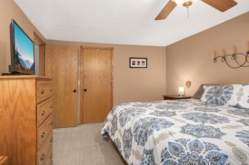 Ample walk-in closet completes this luxurious upper-level primary bedroom