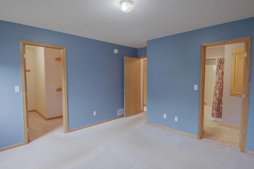 Alternate view of Primary Bedroom. Note walks through to full bathroom and Large Walk in Closet!