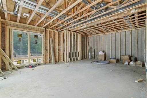 Lower level walk out + Entertaining area / Game space / Bar