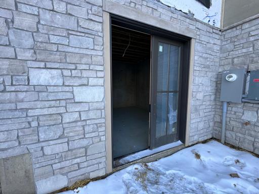 Entrance to exterior storage/flex space - heated!