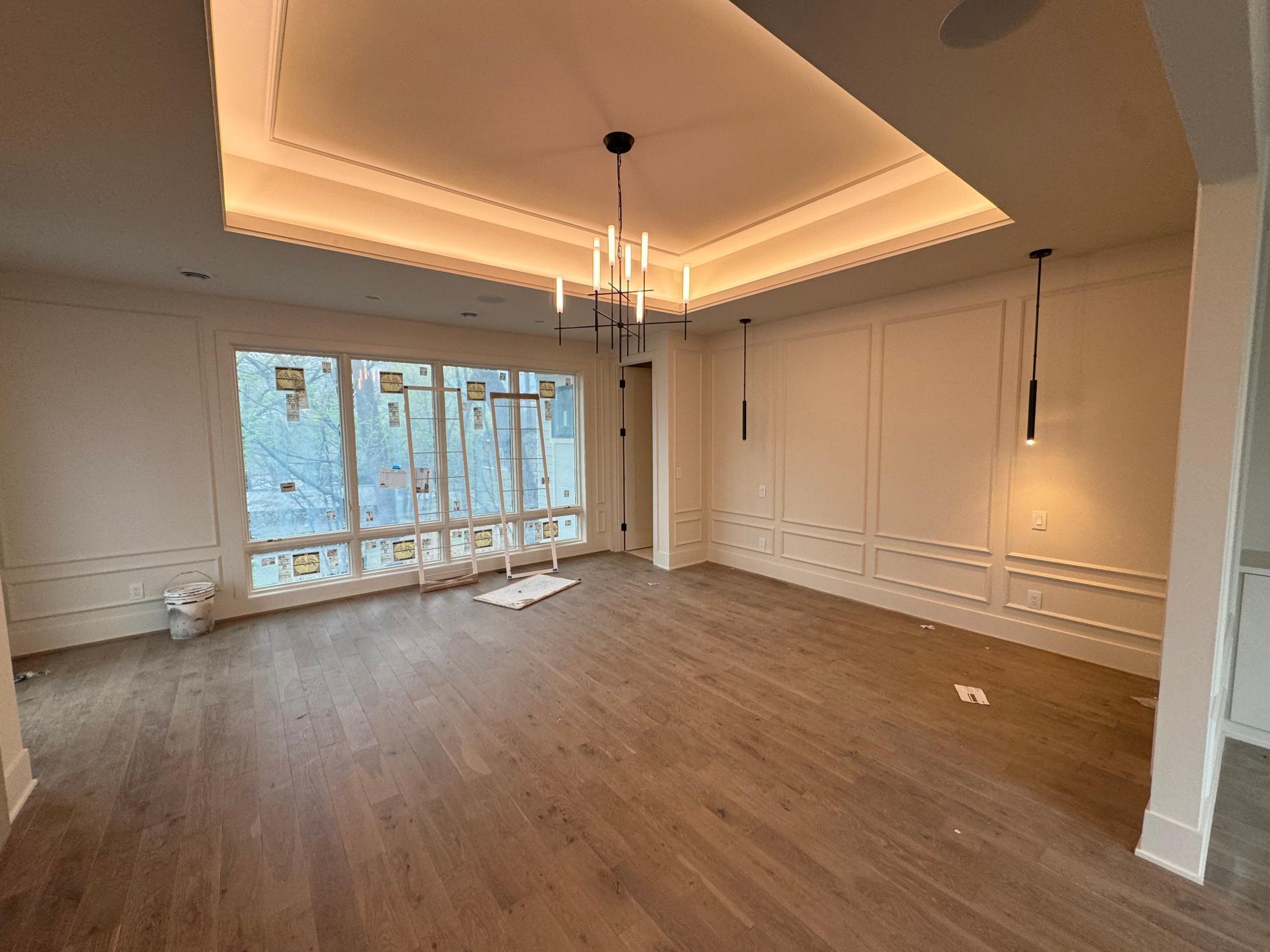 spectacular master bedroom, cove accent lighting, hardwood floors