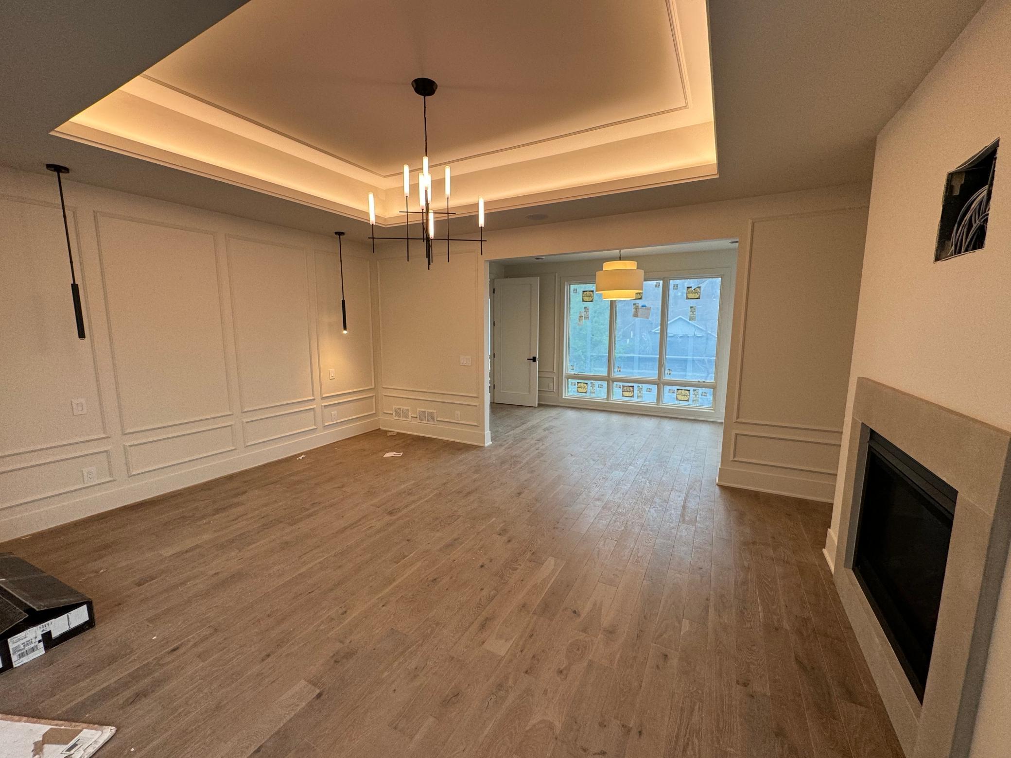 spectacular master bedroom, cove accent lighting, hardwood floors