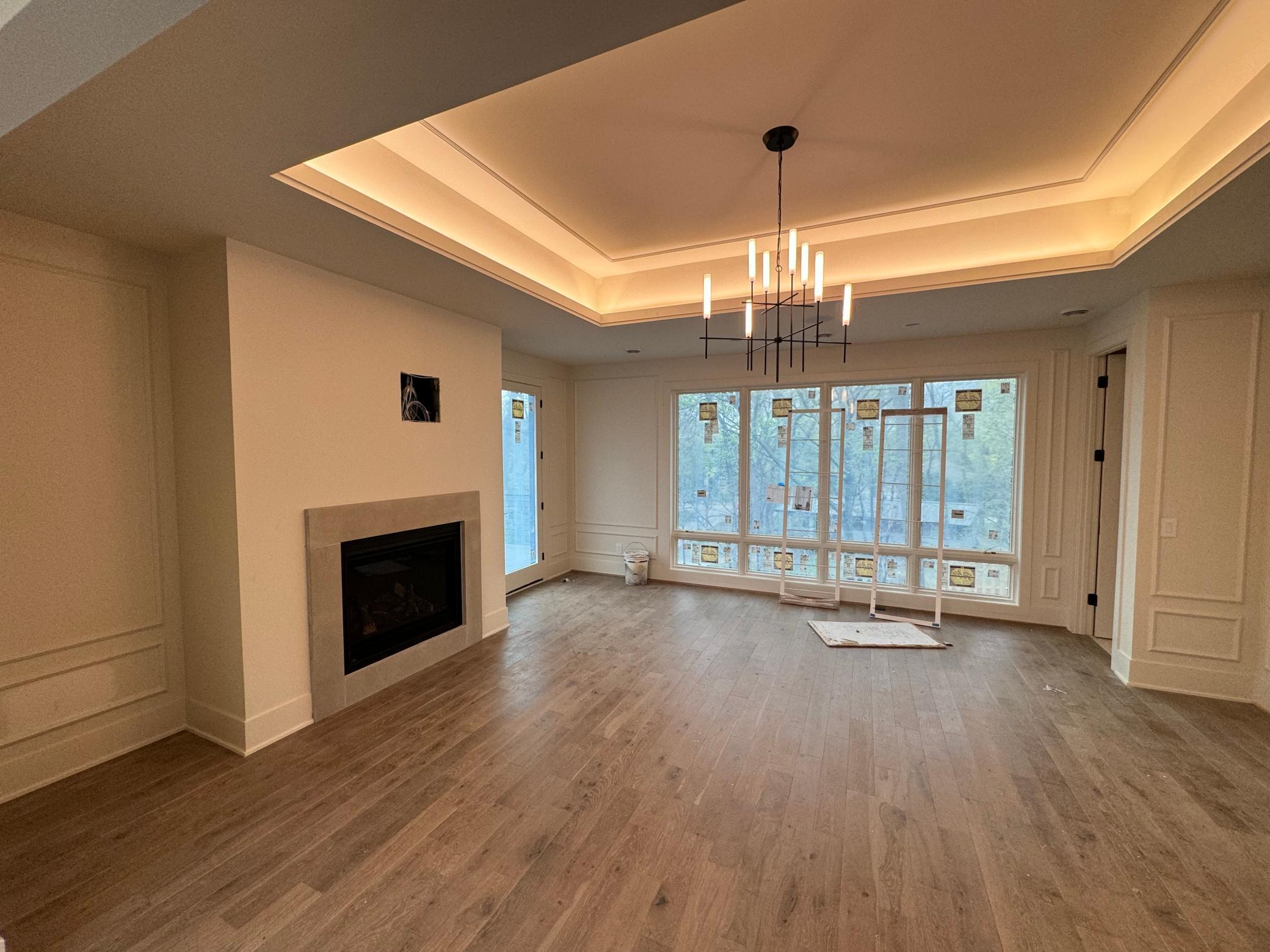 spectacular master bedroom, cove accent lighting, hardwood floors