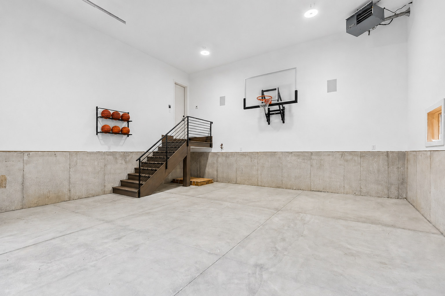 attached 2 car garage can be used as a sport court, or double height for car lifts!