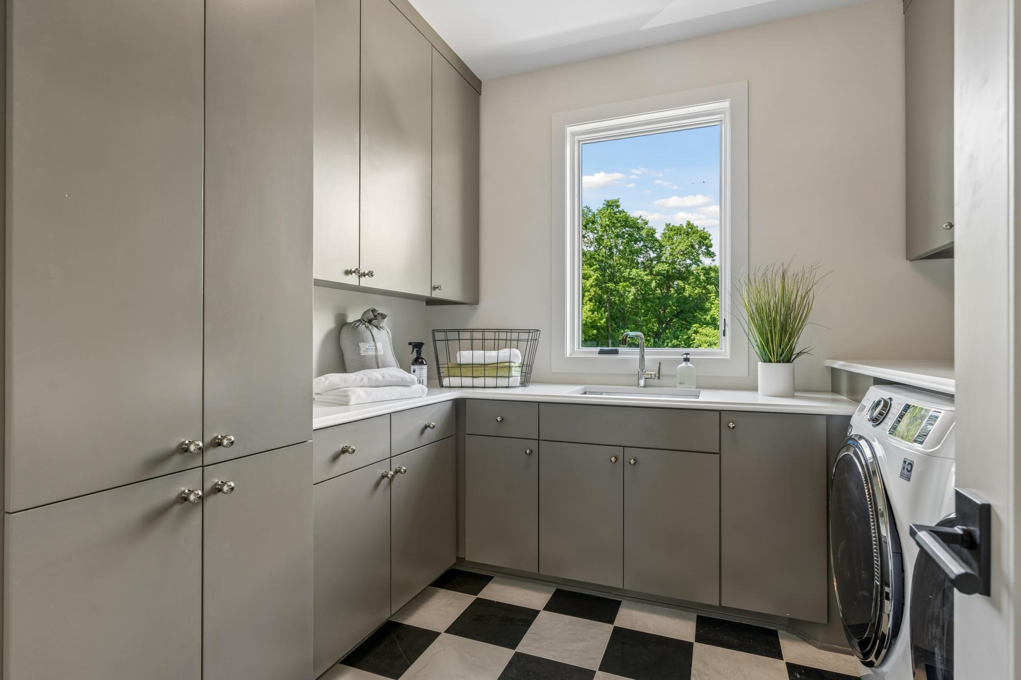 upper level laundry - truly wow - marble checkerboard flooring