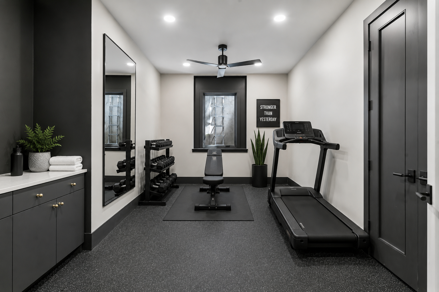 Gym equipment staged - rubber floor installed and ready for your workouts!