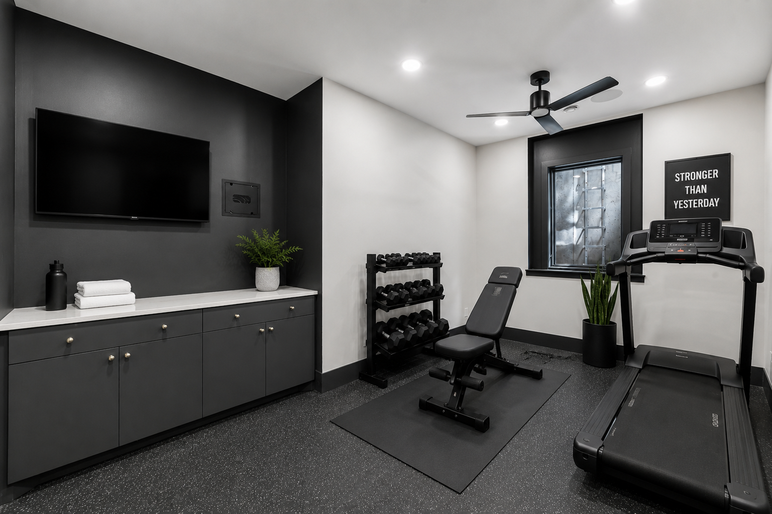 Gym equipment staged - rubber floor installed and ready for your workouts!
