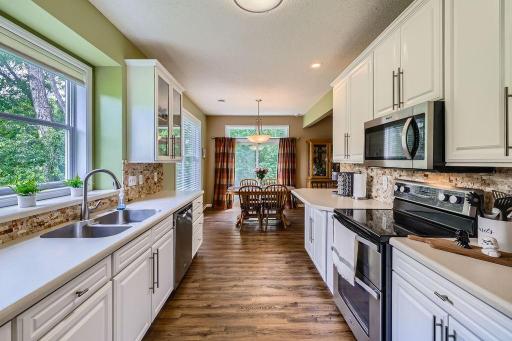 Nice, Sunny kitchen with views of nature.