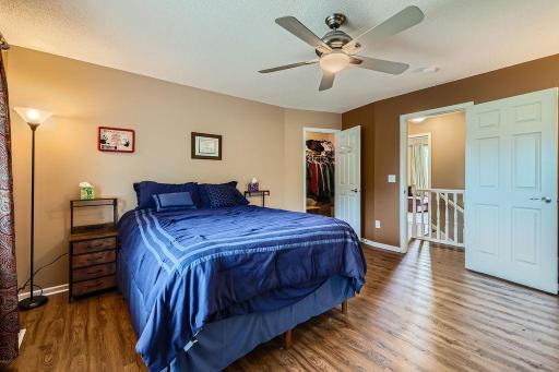 Upper level primary with walk in closet and private full bath