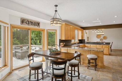 Open-concept dining area ideal for everyday meals or hosting guests inside or out!