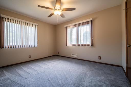 Primary bedroom as spacious closet as well as a 1/4 bath. All you need to do is add a sync to make it a half bath. Plumbing is all there