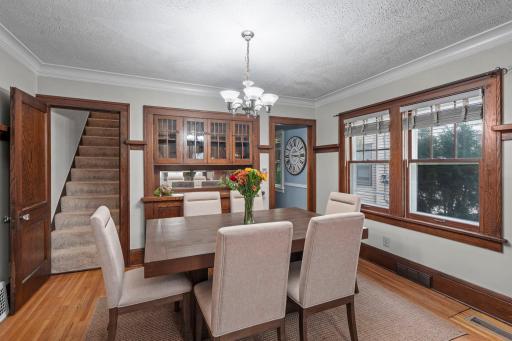 This home features gleaming hardwood floors and gorgeous natural woodwork!