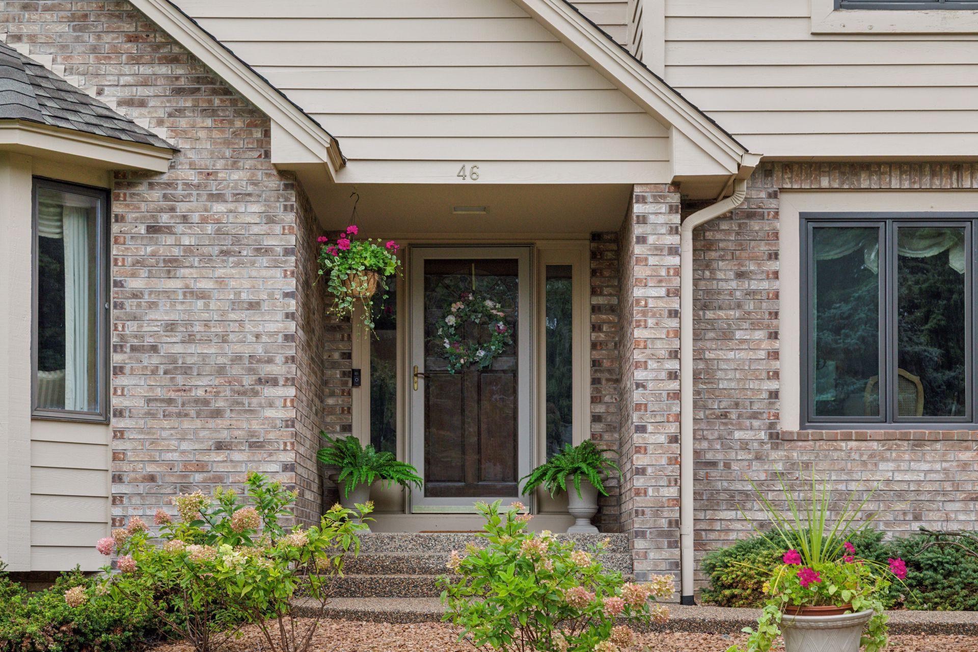 A home designed for memorable gatherings, everyday comfort, and exceptional outdoor living in one of Burnsville’s most desirable settings. Aggregate walkway and steps.