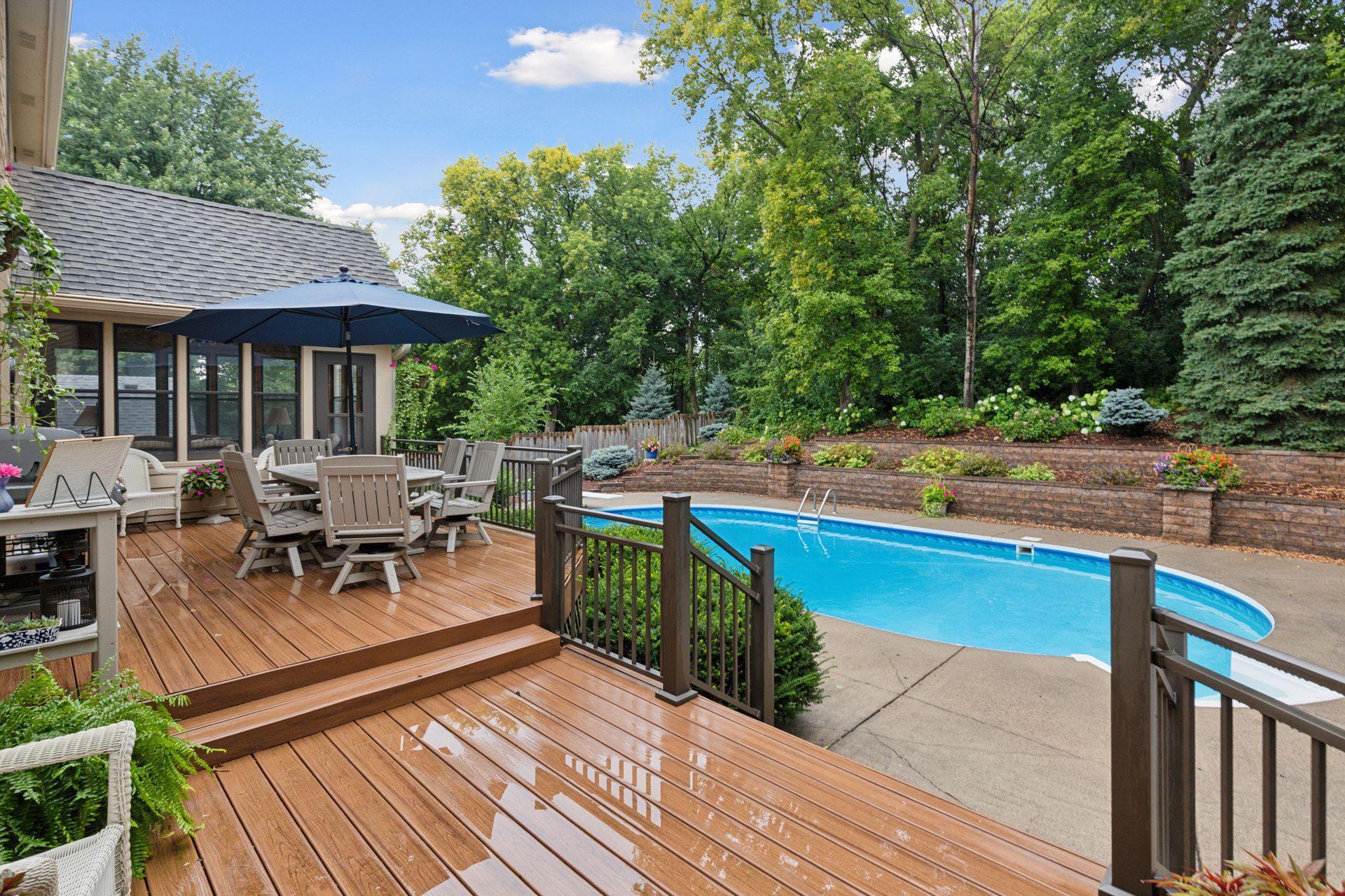 The outdoor setting is a defining feature of this property. Large two-tier composite deck overlooking the entire backyard retreat. Pool scheduled to be open mid-May.