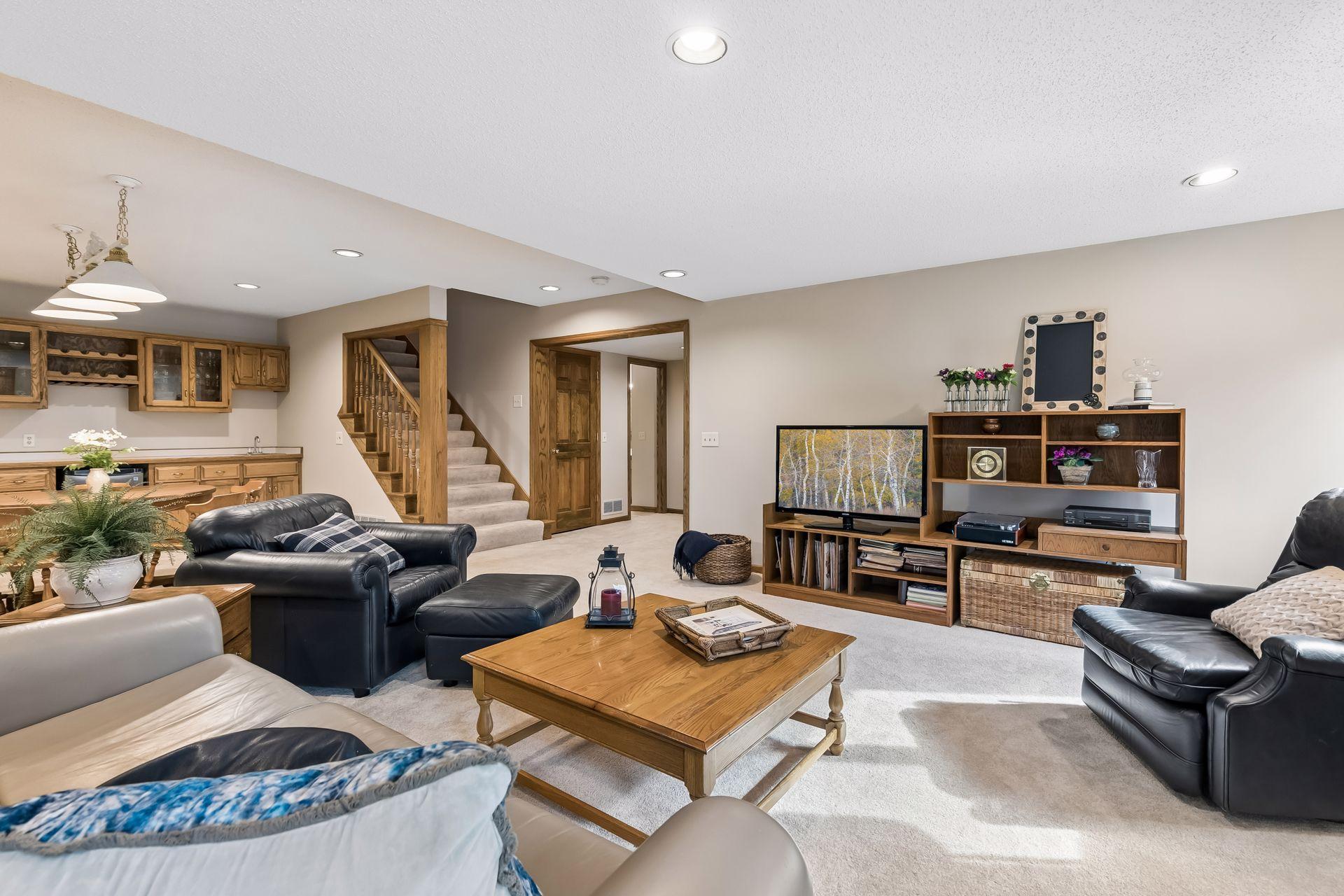 Featuring a second wood-burning fireplace, wet bar, lookout windows.