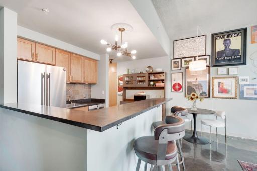 Well-appointed space for both a small table and counter-seating.