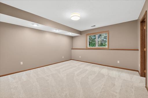 The third bedroom is in the lower level.