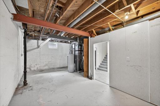Lower level unfinished space and high ceilings