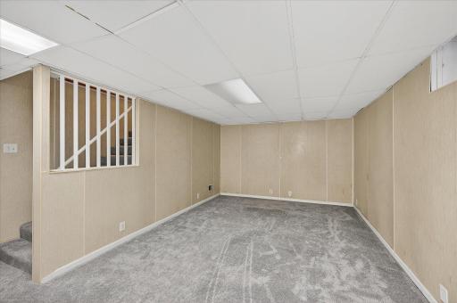 Lower level family room with tall ceilings