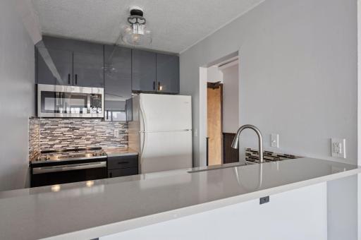 Seller opened up kitchen and added breakfast bar