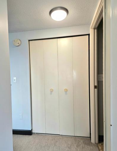 The unit features three large closets: a double closet in the bedroom, full size linen closet and extra deep closet in the hallway