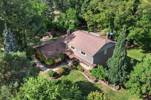 The house backs up to a private wooded setting and is on a quiet culdesac