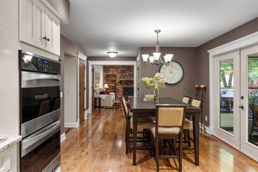 Informal dining with doors to 3 season porch