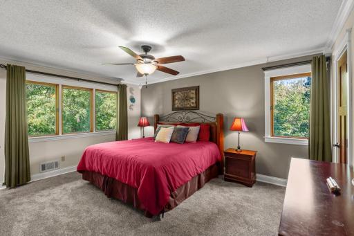 Primary bedroom overlooking backyard, new carpet throughout upper level