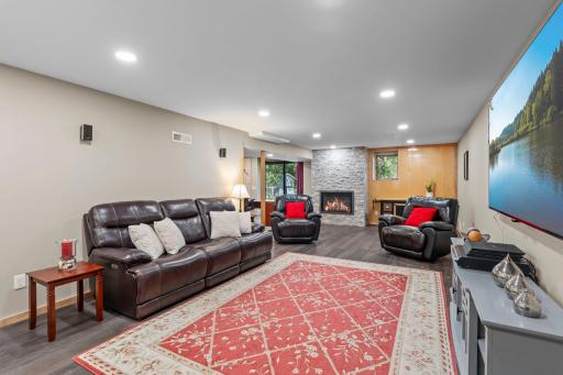 Lower level family room with hardwood floors, remodeled in 2025