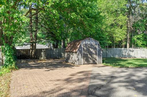 Plenty of room to store a camper etc and a nice storage shed