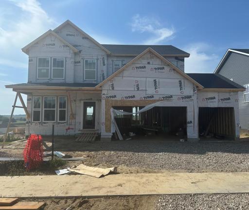 The actual home. The Roof has been installed and in the process of finishing house wrap