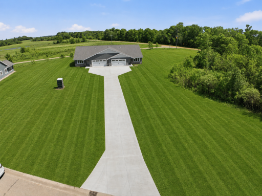 Step outside to a large yard featuring plush green grassâperfect for yard games, outdoor gatherings, family activities, and creating your own backyard retreat.