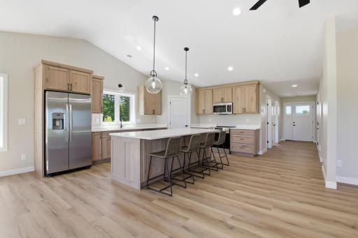 Ideal for gatherings of any size, the integrated kitchen, dining, and living areas offer a welcoming atmosphere for making lasting memories.