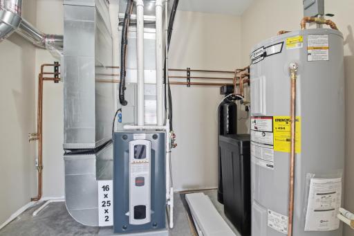 Utility room - conveniently located in the garage to preserve space in the home!