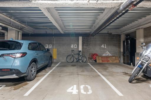 Heated parking space with bike rack